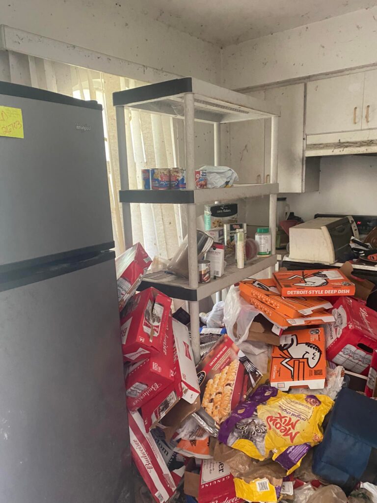 A hoarded kitchen of a senior citizen in Port Charlotte, FL.